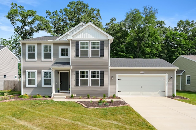 25596 Forest Ln, Mattawan, MI 49071 - view of front of house with driveway, a garage, and board and batten siding