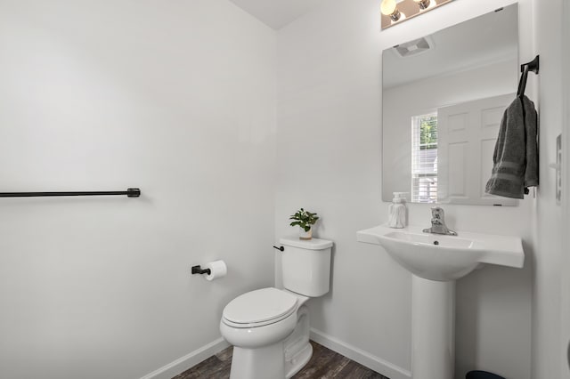 25596 Forest Ln, Mattawan, MI 49071 - half bathroom featuring toilet and wood finished floors
