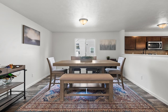 25596 Forest Ln, Mattawan, MI 49071 - dining area with dark wood-style flooring