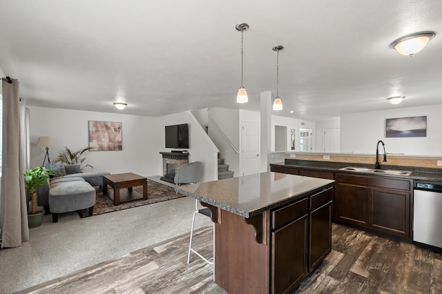 25596 Forest Ln, Mattawan, MI 49071 - kitchen with open floor plan, dishwasher, dark wood-style floors, and a kitchen island