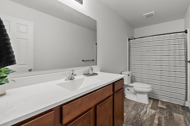 25596 Forest Ln, Mattawan, MI 49071 - full bathroom featuring vanity, wood finished floors, and a shower with shower curtain