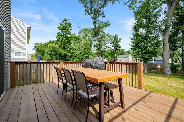 25596 Forest Ln, Mattawan, MI 49071 - wooden deck featuring outdoor dining space and a yard