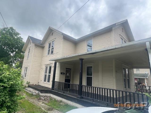 141 E Main St, Morenci, MI 49256 - view of side of home with covered porch