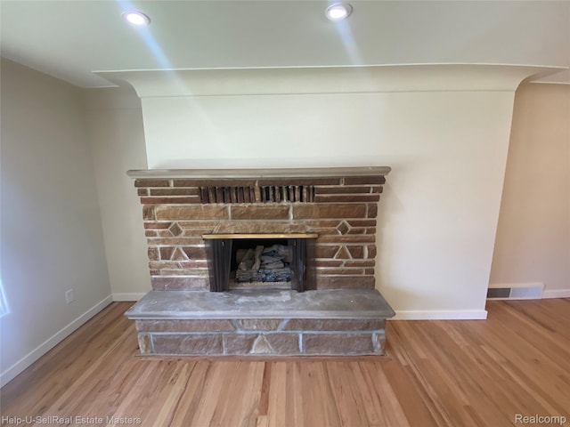 2705 Stone St, Port Huron, MI 48060 - detailed view of wood finished floors, a fireplace, and recessed lighting