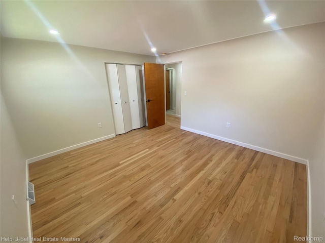 2705 Stone St, Port Huron, MI 48060 - unfurnished bedroom featuring light wood finished floors and a closet