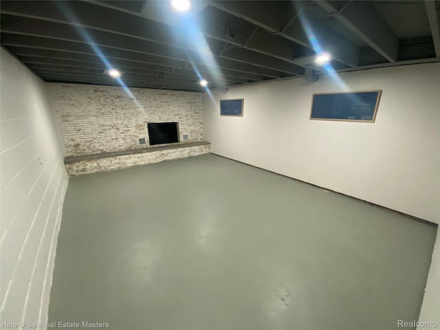 2705 Stone St, Port Huron, MI 48060 - finished below grade area with a large fireplace
