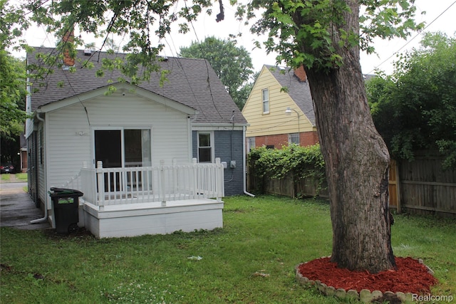20153 Hartwell St, Detroit, MI 48235 - rear view of property with a deck and roof with shingles