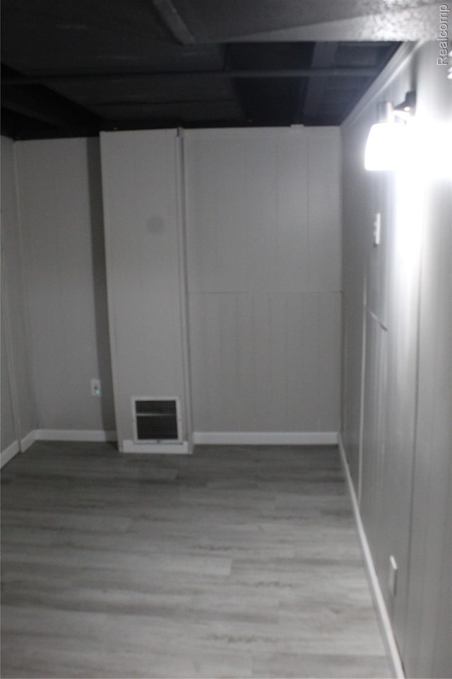 20153 Hartwell St, Detroit, MI 48235 - finished basement with light wood-style floors and baseboards