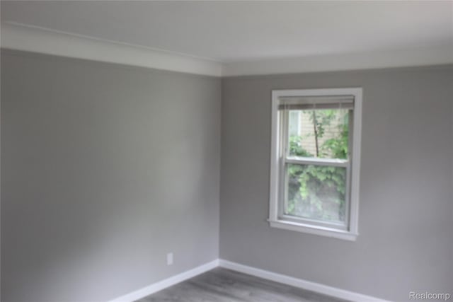 20153 Hartwell St, Detroit, MI 48235 - empty room with baseboards and wood finished floors