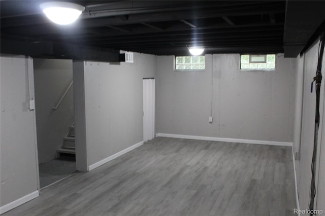 20153 Hartwell St, Detroit, MI 48235 - basement featuring wood finished floors and stairway