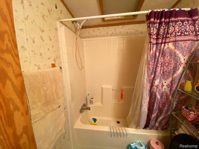 5424 Hughes Rd, Lansing, MI 48911 - full bathroom with shower / bathtub combination with curtain and wallpapered walls
