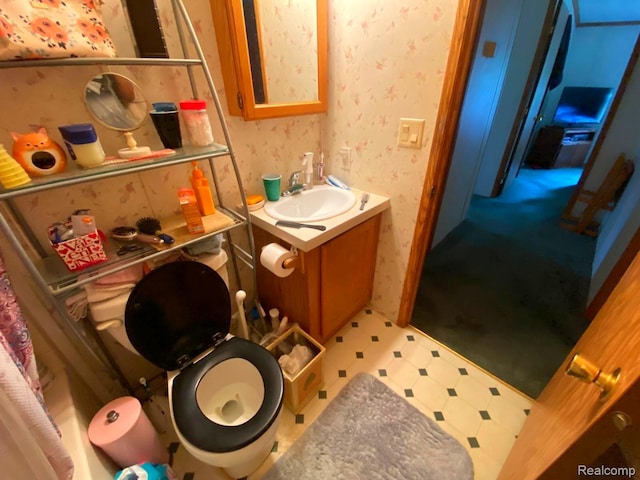 5424 Hughes Rd, Lansing, MI 48911 - bathroom featuring vanity, tile patterned floors, and wallpapered walls