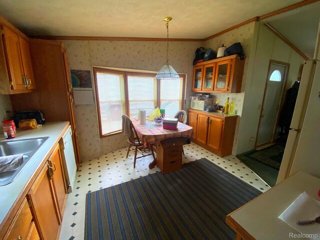 5424 Hughes Rd, Lansing, MI 48911 - kitchen featuring crown molding, wallpapered walls, brown cabinets, light floors, and light countertops