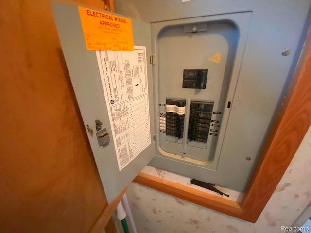 5424 Hughes Rd, Lansing, MI 48911 - utility room with electric panel