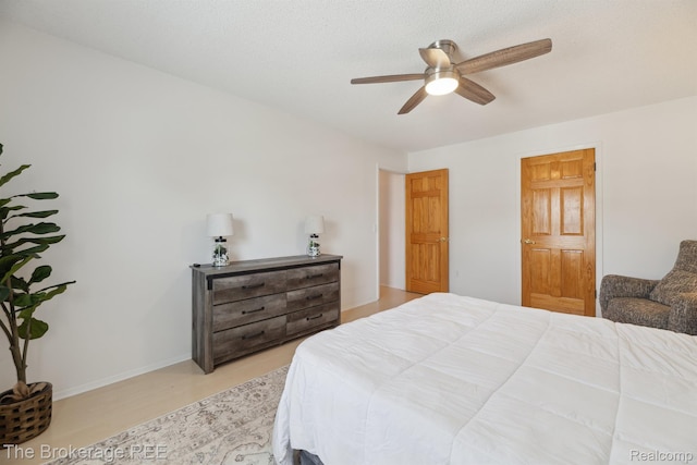 9451 Parkwood N, Davison, MI 48423 - bedroom with ceiling fan and light wood-type flooring