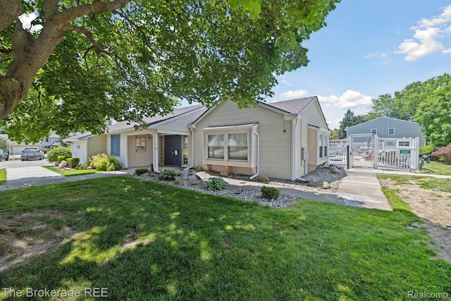 9451 Parkwood N, Davison, MI 48423 - ranch-style home featuring a gate