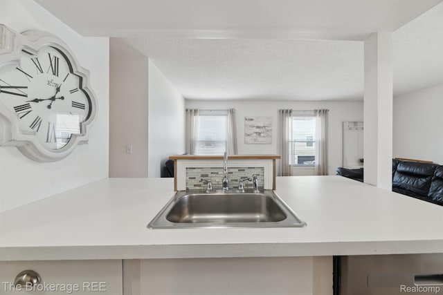 9451 Parkwood N, Davison, MI 48423 - kitchen featuring light countertops and a textured ceiling