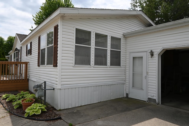 4105 Sawgrass Trl, Muskegon, MI 49442 - view of home's exterior featuring a patio and a deck