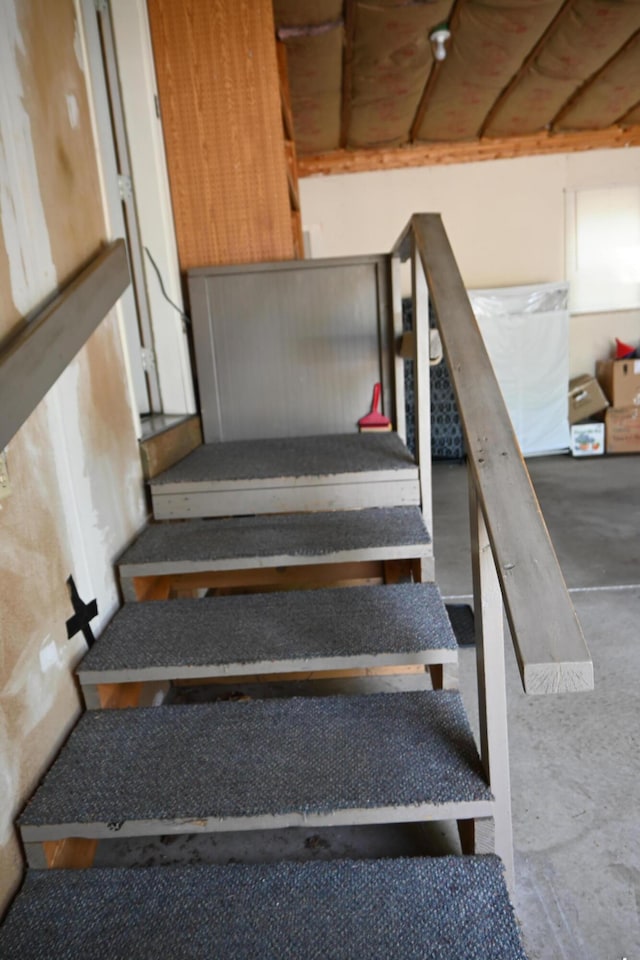 4105 Sawgrass Trl, Muskegon, MI 49442 - stairway with unfinished concrete flooring