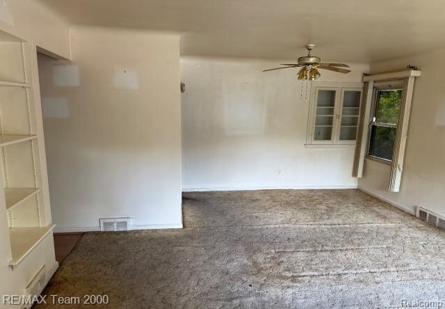 3929 Grayton St, Detroit, MI 48224 - carpeted empty room featuring ceiling fan and baseboards