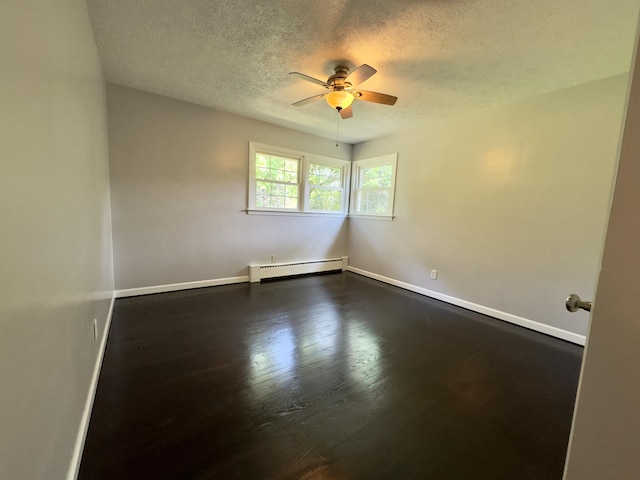 1358 Neece Dr, Norton Shores, MI 49441 - empty room featuring a baseboard radiator, a textured ceiling, ceiling fan, and dark wood-type flooring