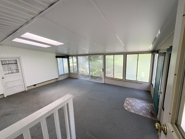 1358 Neece Dr, Norton Shores, MI 49441 - unfurnished sunroom with carpet floors and a skylight