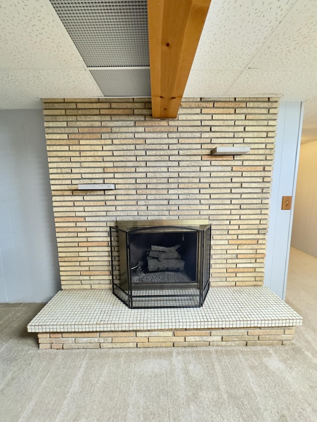1358 Neece Dr, Norton Shores, MI 49441 - detailed view of carpet floors and a fireplace