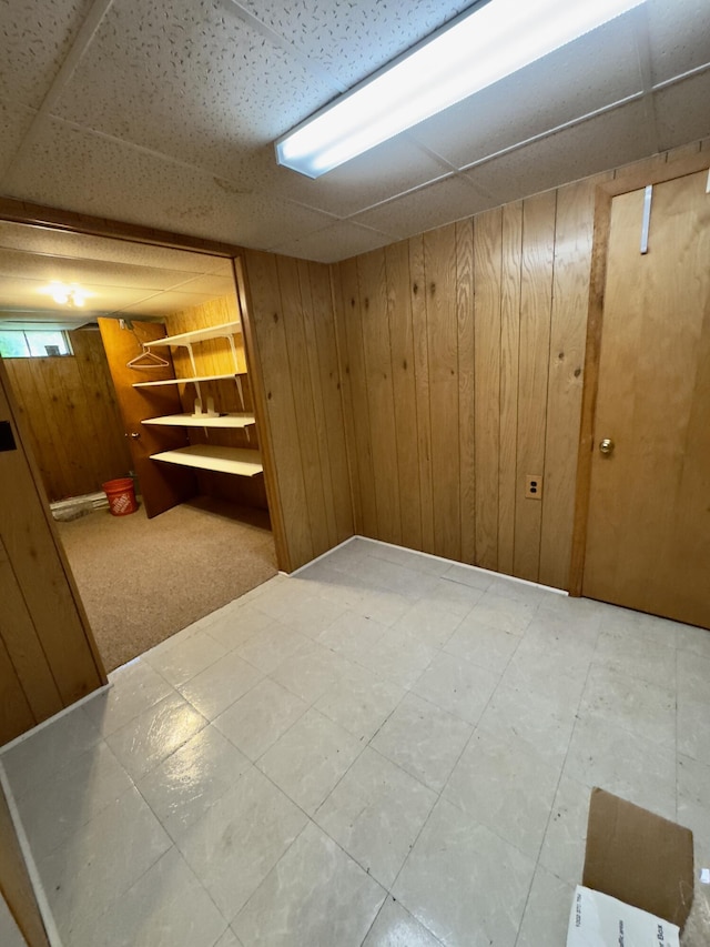 1358 Neece Dr, Norton Shores, MI 49441 - finished below grade area with wood walls and a drop ceiling