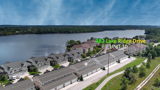 982 Lake Ridge Dr, Traverse City, MI 49684 - aerial perspective of suburban area featuring a nearby body of water