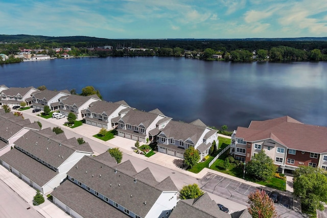 982 Lake Ridge Dr, Traverse City, MI 49684 - aerial perspective of suburban area with a nearby body of water