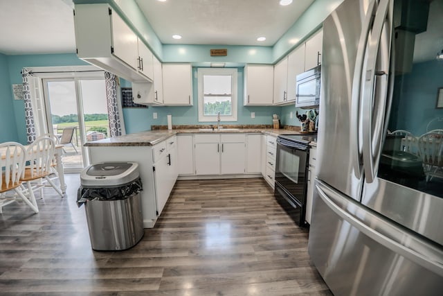 68026 Union Rd S, Union, MI 49130 - kitchen with smart refrigerator, electric range, dark wood finished floors, recessed lighting, and white cabinets