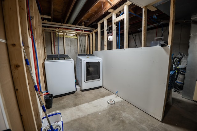 68026 Union Rd S, Union, MI 49130 - unfinished basement featuring washing machine and dryer