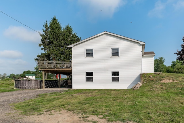 68026 Union Rd S, Union, MI 49130 - view of property exterior with a deck, gravel driveway, and a yard