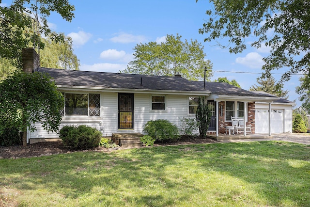 8565 Rives Junction Rd, Rives Junction, MI 49277 - ranch-style home featuring a garage, a front lawn, a chimney, and driveway