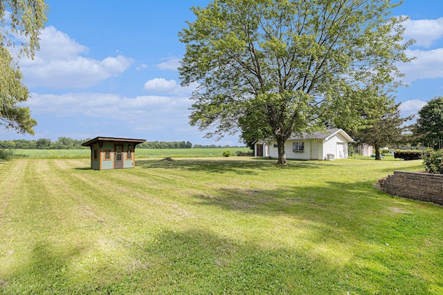 8565 Rives Junction Rd, Rives Junction, MI 49277 - view of grassy yard featuring an outdoor structure