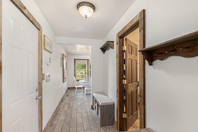8565 Rives Junction Rd, Rives Junction, MI 49277 - foyer entrance featuring wood finished floors and baseboards