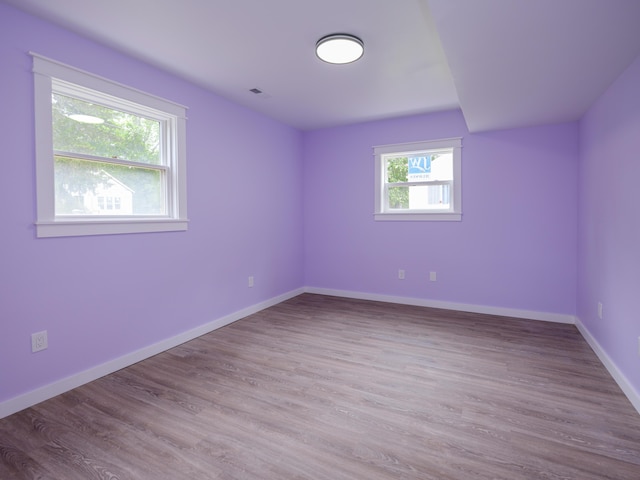 520 Della St, Portage, MI 49002 - spare room featuring wood finished floors
