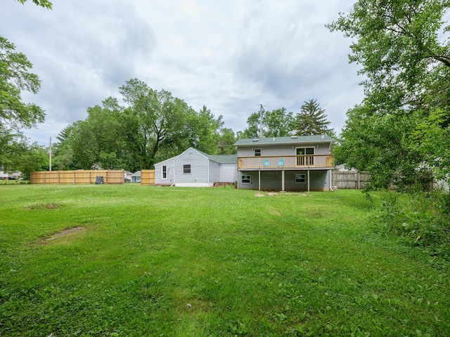 520 Della St, Portage, MI 49002 - rear view of house with a wooden deck