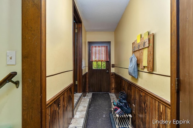 10201 Fillmore St, Zeeland, MI 49464 - doorway with wainscoting and wooden walls