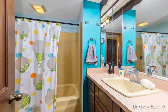 10201 Fillmore St, Zeeland, MI 49464 - bathroom featuring vanity and shower / bathtub combination with curtain