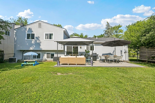 9241 Abbey Ln, Ypsilanti, MI 48198 - back of house with outdoor lounge area and a patio area