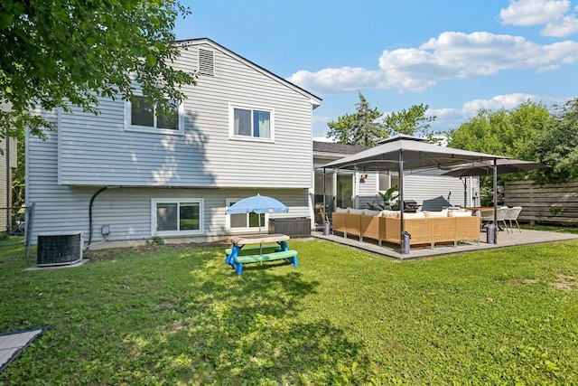 9241 Abbey Ln, Ypsilanti, MI 48198 - rear view of property featuring outdoor lounge area, a gazebo, and a patio area