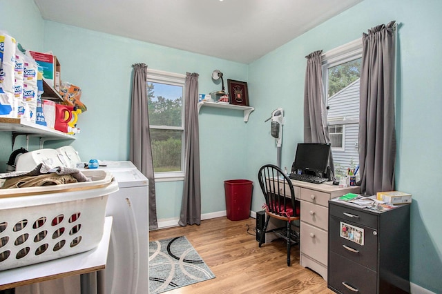 6779 1st Dr, Coloma, MI 49038 - office space featuring washing machine and dryer, plenty of natural light, and light wood finished floors