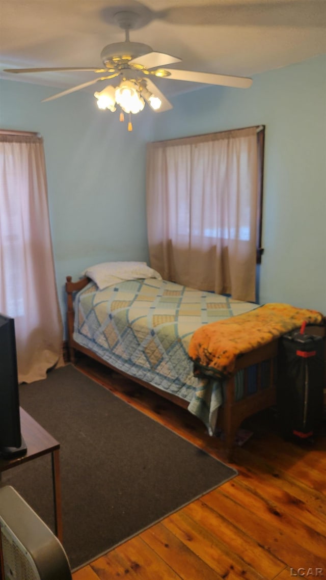 511 E Main St, Morenci, MI 49256 - bedroom featuring wood finished floors and a ceiling fan