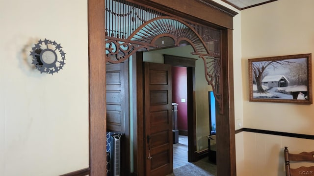 511 E Main St, Morenci, MI 49256 - hallway with a wainscoted wall and crown molding