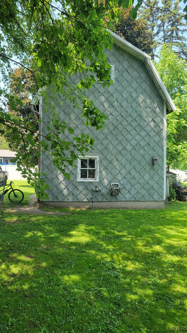 511 E Main St, Morenci, MI 49256 - view of side of property featuring a lawn