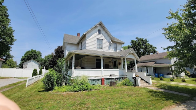511 E Main St, Morenci, MI 49256 - view of front of property with covered porch and a chimney