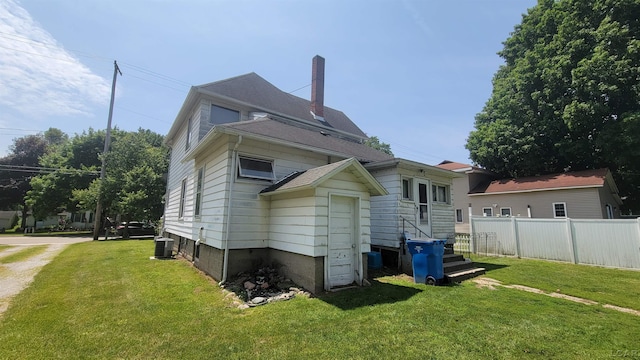 511 E Main St, Morenci, MI 49256 - back of property featuring a chimney