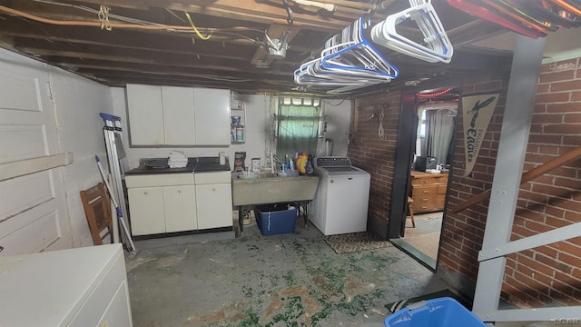 511 E Main St, Morenci, MI 49256 - below grade area with washer / dryer and a sink