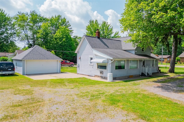 29463 Sibley Rd, Romulus, MI 48174 - view of property exterior featuring a chimney, roof with shingles, a yard, a detached garage, and an outdoor structure